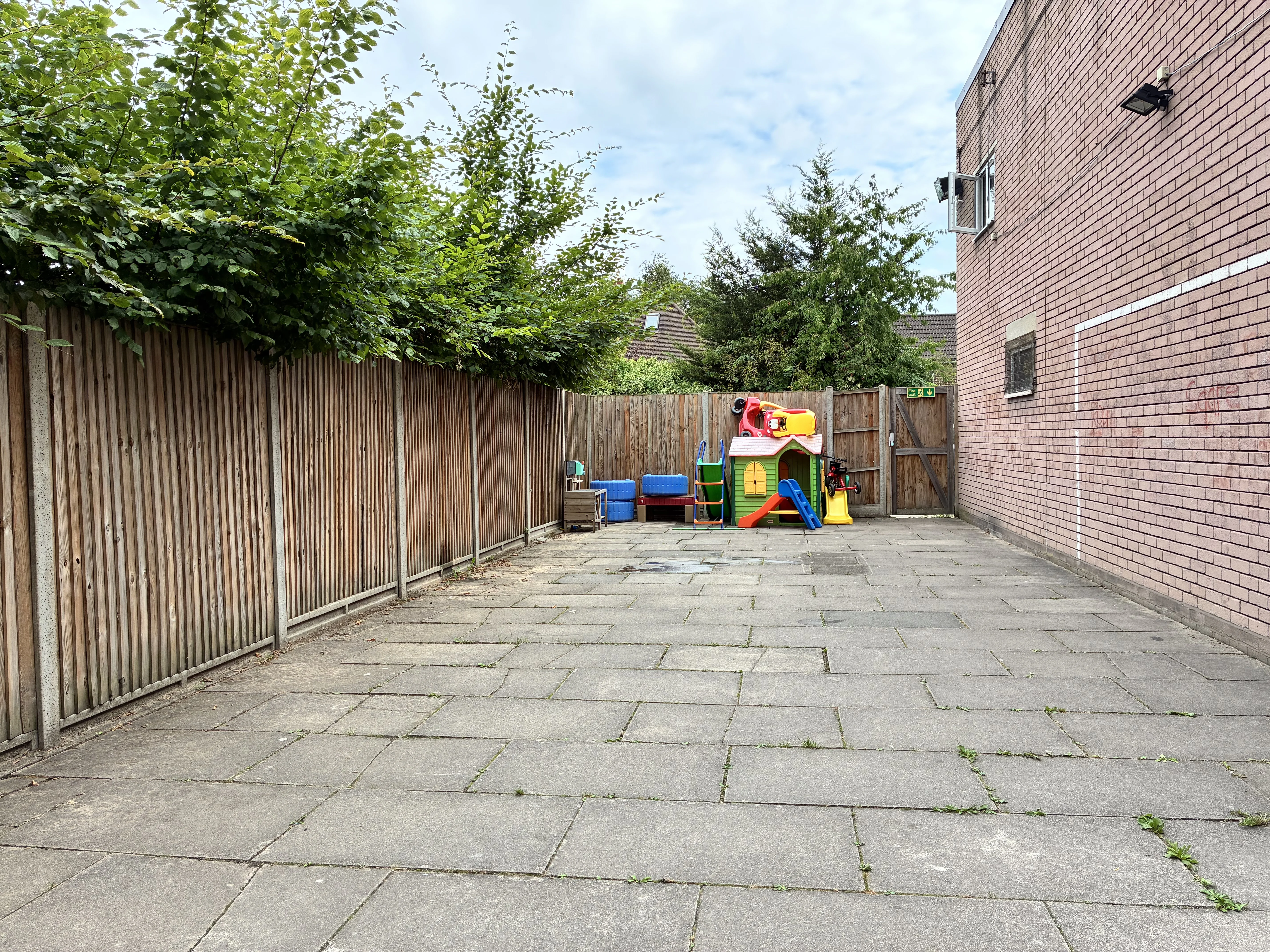 Outdoor space alongside the building